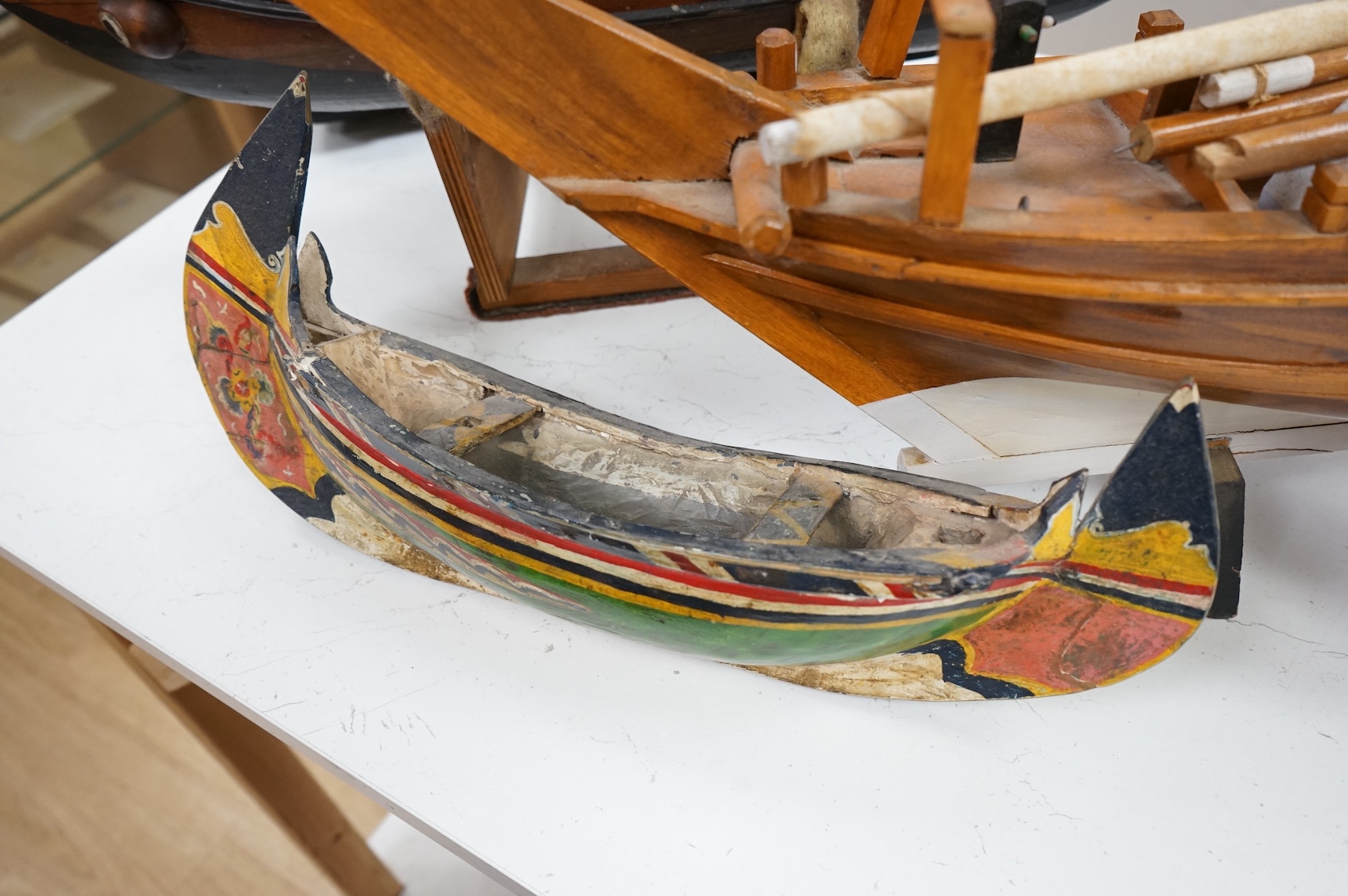 A model of a Chinese junk, a model ship and two other models of boats, largest 71cm in length